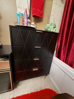 Black and gold dresser