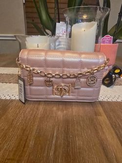 NWT bebe Jacari crossbody handbag in pink iridescent mauve