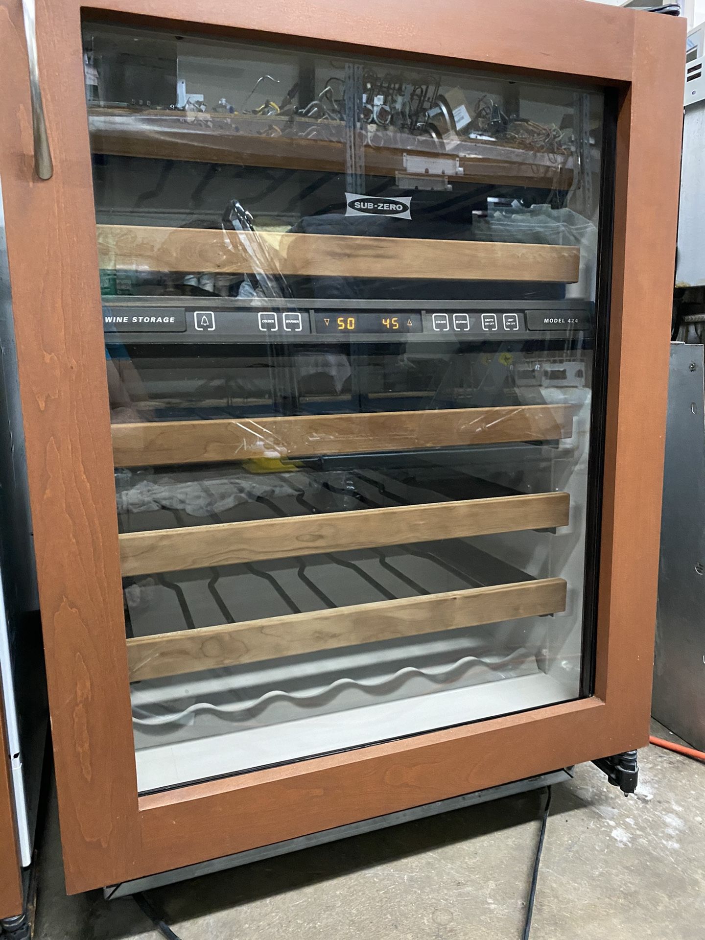 Sub zero 424 wood paneled wine fridge 80 bottle each 2 available. dual