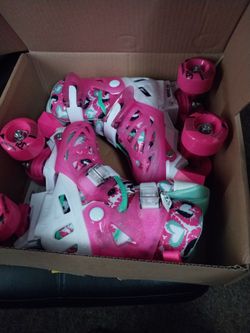 Girls pink roller skates. Size USA 12-2 Girls