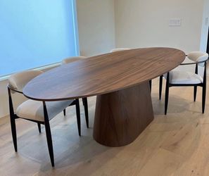 Walnut oval dining table