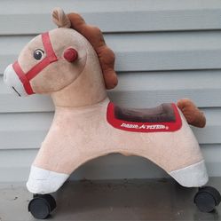 Kids Riding Horse - $25