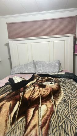 White queen size bed frame with headboard and box spring