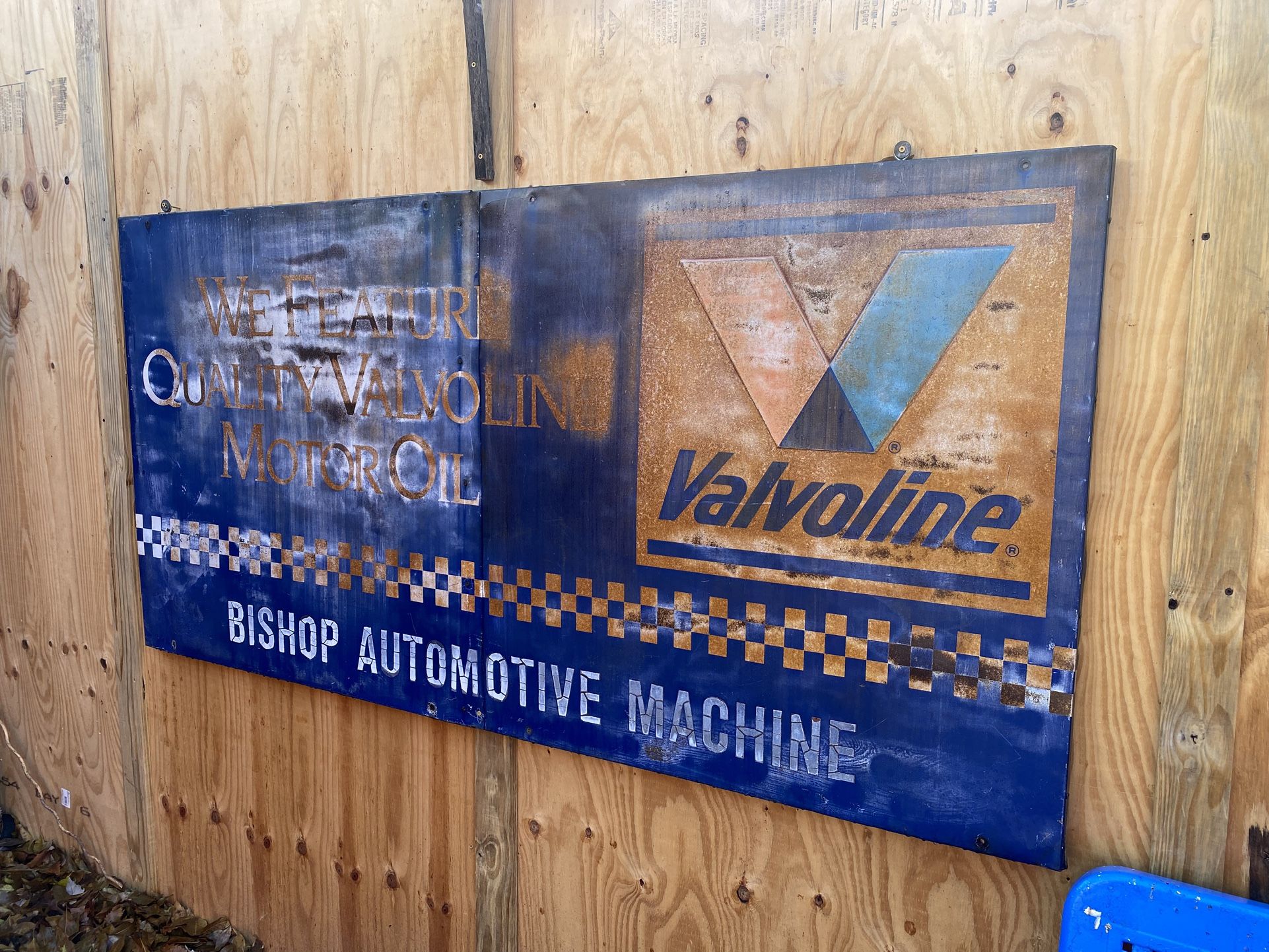 Old antique automotive sign from Bastrop, early 70s