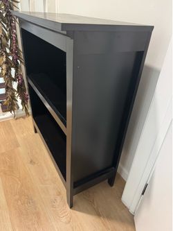 Black two shelf bookcase.  Height = 36 inches Width = 31 inches Depth = 14 inches