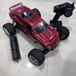 Upgraded Traxxas Nitro Rustler 2.5 RC Car (Extra engine!)