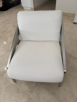White and chrome leather chair
