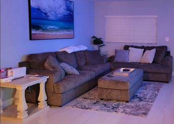 Couch with queen sleeper, love seat and ottoman