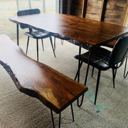 Live edge solid acacia wood dinning table, benches and chairs.