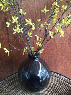 blown glass vase with flowers