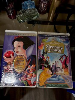 Snow White vhs and sleeping beauty vhs