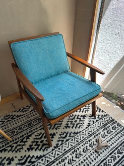 Mid century armchair style teak and padded Must be gone by 6/21.