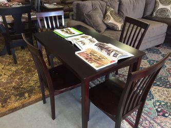 BRAND NEW TABLE WITH 4 CHAIRS!!!