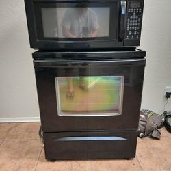 Matching Whirlpool Electric Glasstop Range and Microwave Oven