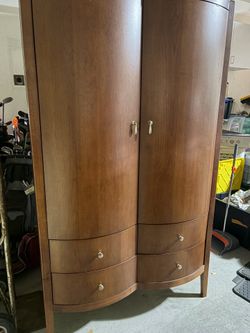 Gorgeous solid wood clothing armoire