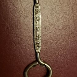 Antique IDEAL DAIRY CO. Bottle Opener