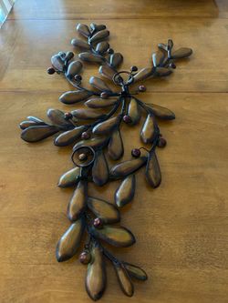 Metal Wall Art. 38 inches wide x 25.5 inches long.