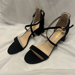 Woman’s Black Heels Size 9