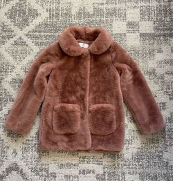 Girl’s collared faux fur coat from H&M in a dusty pink shade, size 10