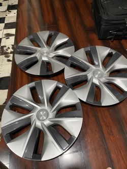 3 Tesla Hubcaps 