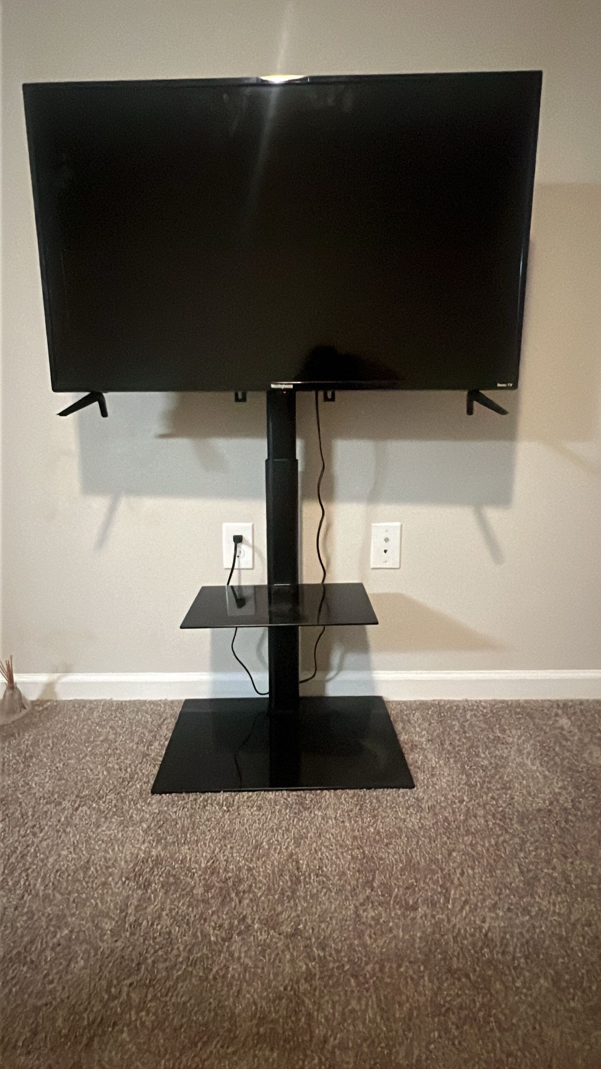 Roku TV and Tv Stand 