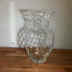 It serves as a centerpiece in living rooms, dining rooms, or hallways, adding texture and color to the décor.