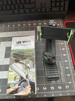 Sun visor phone holder