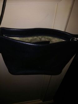 Small coach purse. Black leather