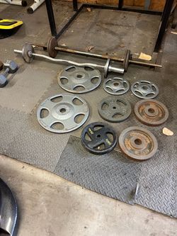 Squat rack, dumbbells, plates and bars