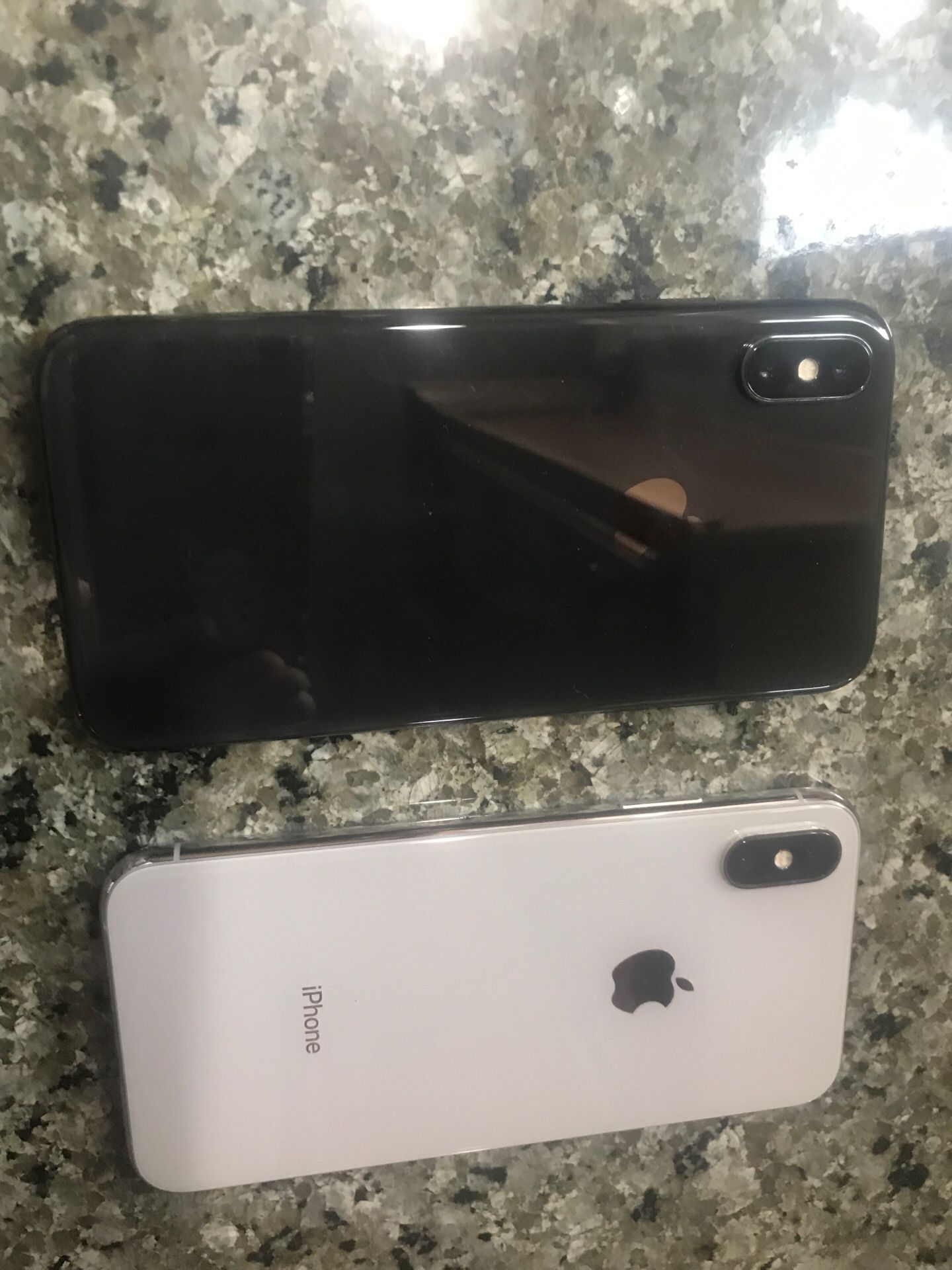 IPhone X 64 Verizon Unlocked with case one silver one black 600 each