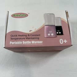 New never usted.  BabySafe Portable Bottle Warmer