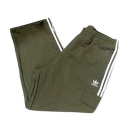 Adidas green track pants baggy