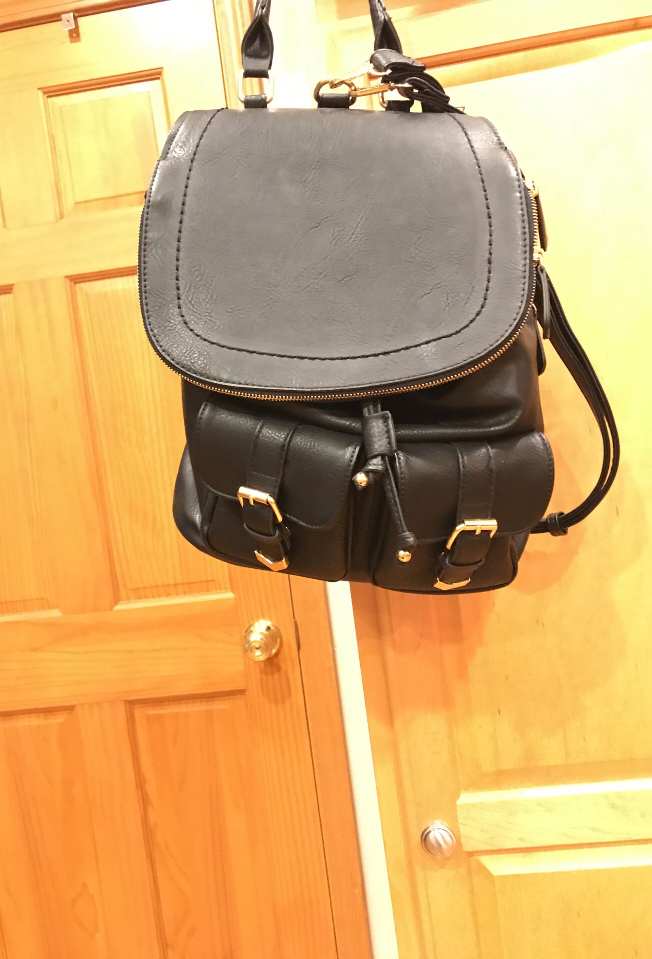 Madison West Black Faux Leather Backpack. Used one time, excellent condition very clean.