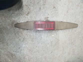 1968 Cadillac tail light lense and bezel