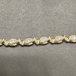 Diamond And 14 Karat Gold Tennis Bracelet