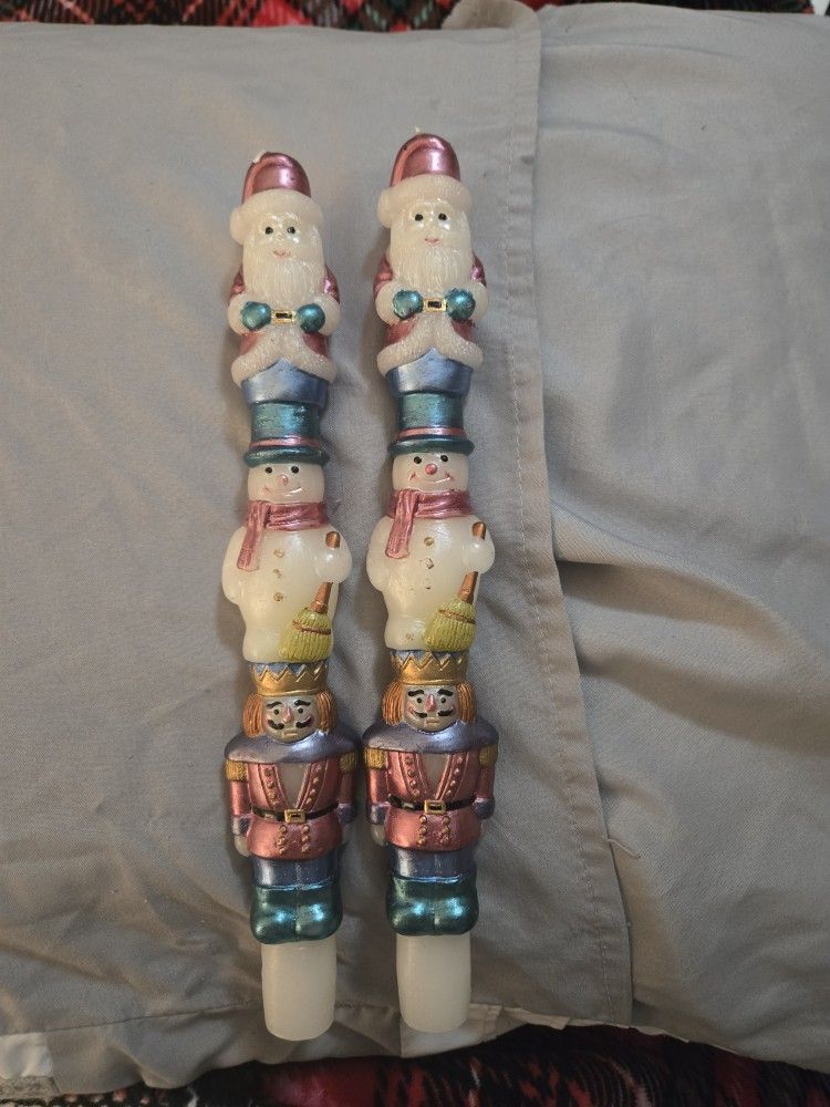 Never Used. (2) Christmas Characters Candle Sticks.