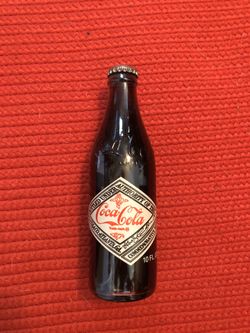 75th anniversary coke bottle unopened