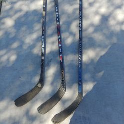 hockey sticks - 1 adult, 2 junior