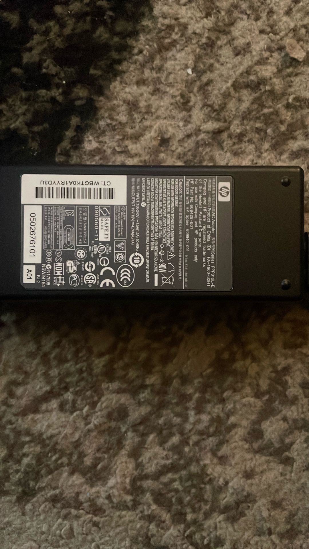 HP laptop charger, specifically a Series PPP012L-E AC adapter.  