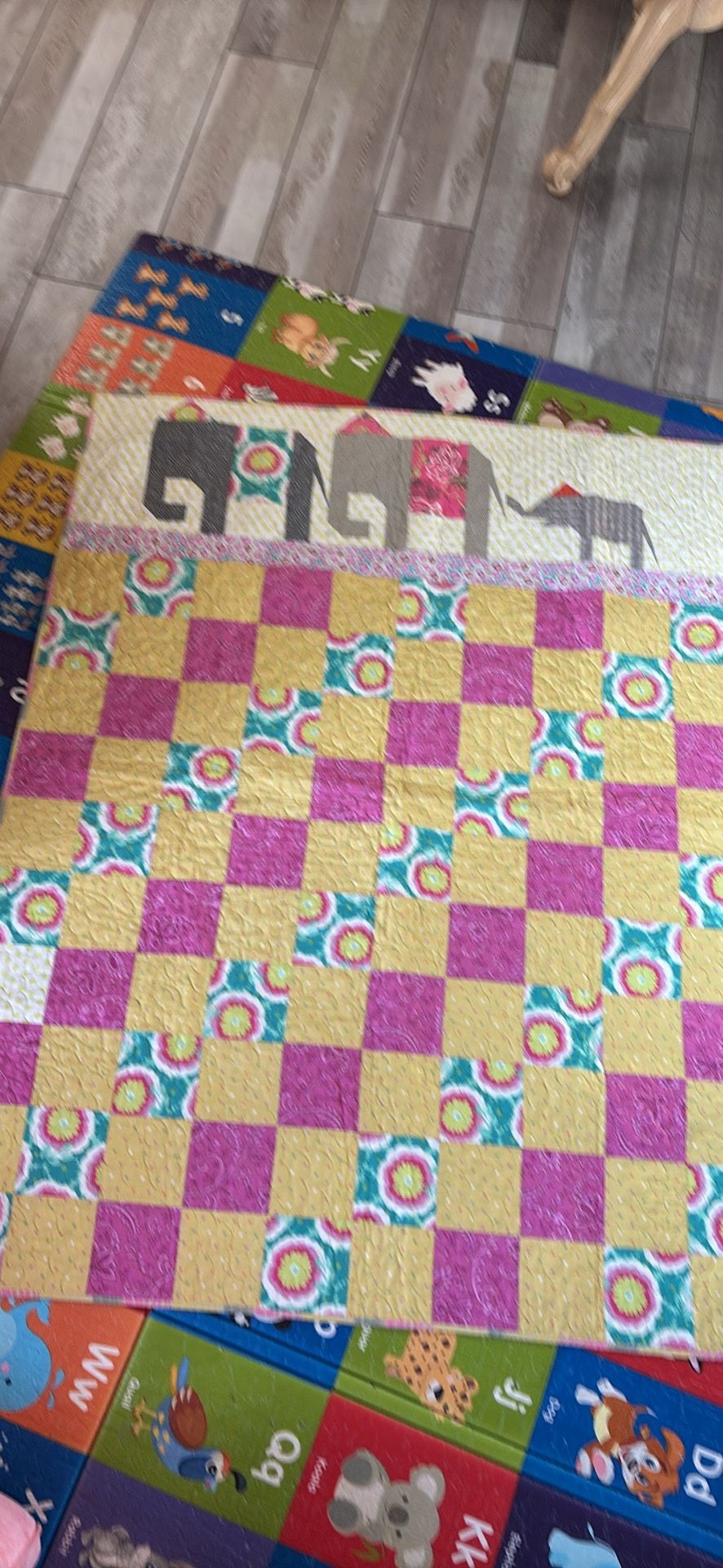Quilt 42x53 hand sewn multitude of colors and patterns elephant trio at top
