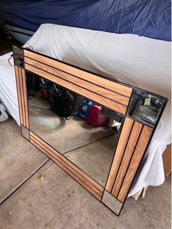 Mirror with wood frame