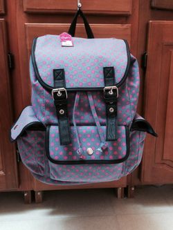 Brand new Candie's backpack. Blue-gray with pink polka dots.