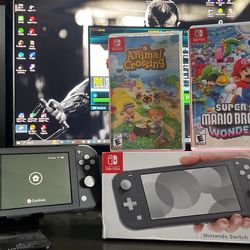 Grey Nintendo switch Light with Games and Original Box