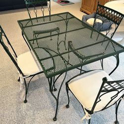 Wrought iron table and 4 chairs