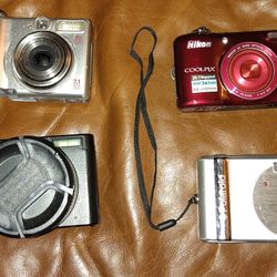 Cannon, Nikon, Minolita & Polaroid 35mm Cameras