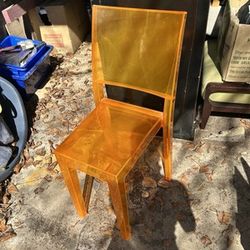 Authentic ghost chair in orange and yellow