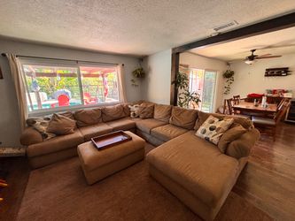 Sectional couch with chaise lounge and ottoman
