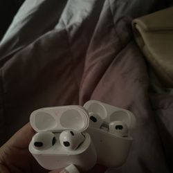 Two pairs of airpods.