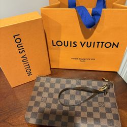Louis Vuitton wristlet brand new