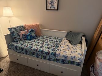 White Twin Day Bed  Storage space on bottom Opens up to make another bed Brand new twin mattress!